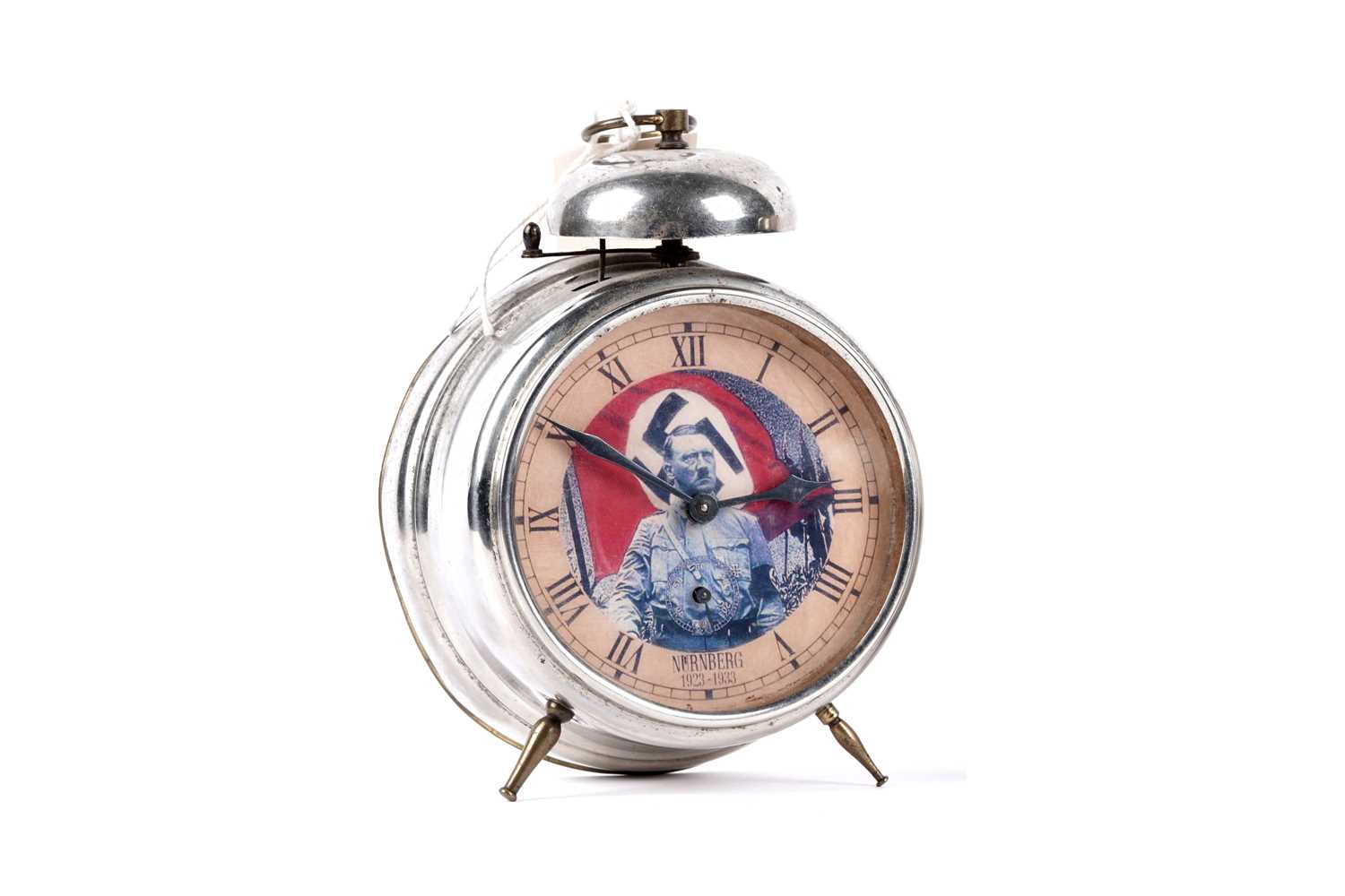 Lot 335 - A German Nurnberg alarm clock, with Adolf Hitler portrait dial