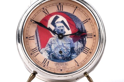 Lot 351 - A German Nurnberg alarm clock, with Adolf Hitler portrait dial