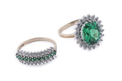 Lot 159 - A green and white stone half eternity ring; and a green and white stone cluster dress ring