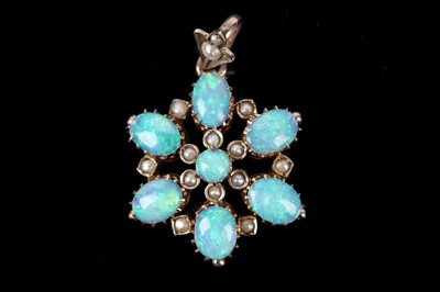 Lot 116 - An opal and seed pearl pendant