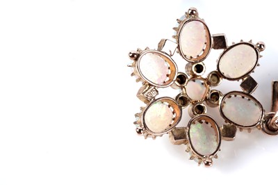 Lot 116 - An opal and seed pearl pendant