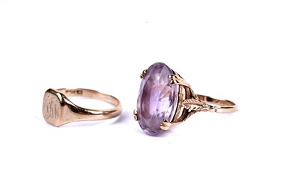 Lot 201 - An amethyst cocktail ring; and a gold signet ring