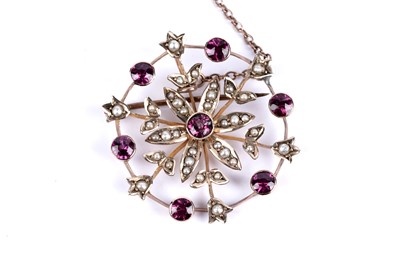 Lot 204 - An Edwardian amethyst and seed pearl brooch