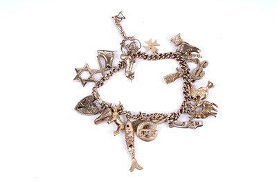 Lot 200 - A 9ct rose gold charm bracelet