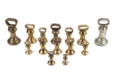 Lot 243 - A collection of antique brass postal weights