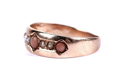 Lot 202 - A Victorian 15ct gold coral and seed pearl ring