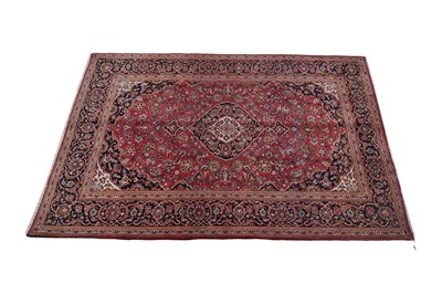 Lot 147 - A hand-knotted Persian Kashan carpet