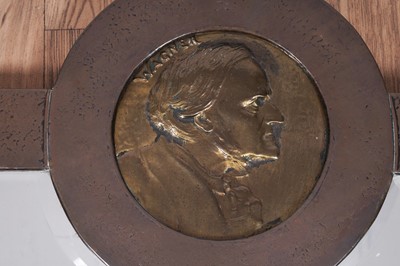 Lot 149 - An early 20th Century Arts and Crafts copper mirror