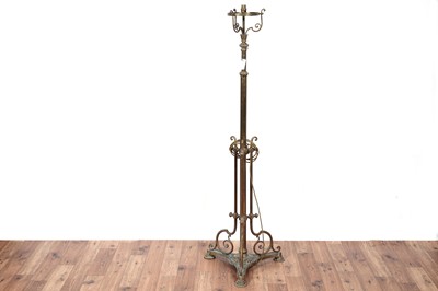 Lot 176 - A late 19th Century brass standard lamp