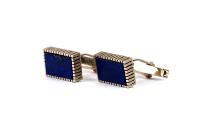 Lot 218 - A pair of lapis lazuli cufflinks