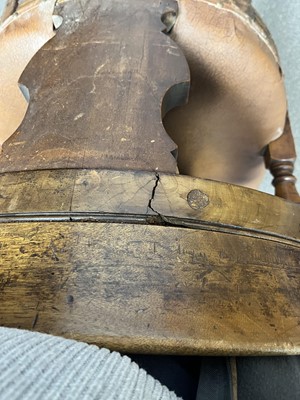 Lot 7 - A pair of early 20th Century ecclesiastical walnut captain's armchairs