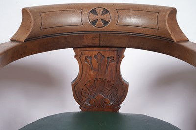 Lot 8 - A trio of early 20th Century ecclesiastical walnut captain's armchairs