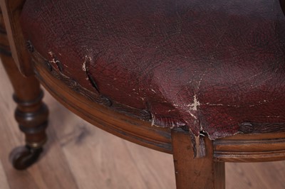 Lot 8 - A trio of early 20th Century ecclesiastical walnut captain's armchairs