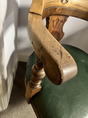 Lot 8 - A trio of early 20th Century ecclesiastical walnut captain's armchairs