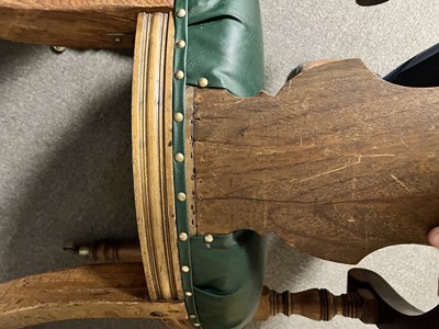 Lot 8 - A trio of early 20th Century ecclesiastical walnut captain's armchairs