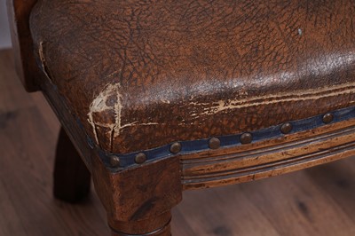 Lot 8 - A trio of early 20th Century ecclesiastical walnut captain's armchairs