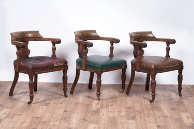 Lot 8 - A trio of early 20th Century ecclesiastical walnut captain's armchairs