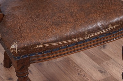 Lot 8 - A trio of early 20th Century ecclesiastical walnut captain's armchairs