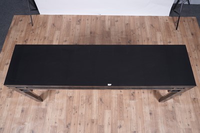 Lot 19 - A substantial contemporary Chinese style ebonised console table
