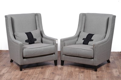 Lot 21 - Kelly Hoppen: a pair of ‘Emma’ wingback armchairs