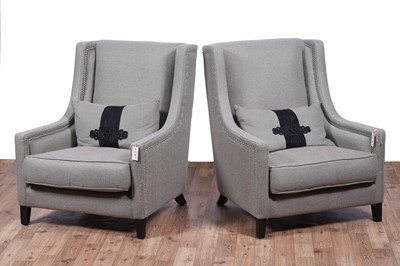 Lot 21 - Kelly Hoppen: a pair of ‘Emma’ wingback armchairs