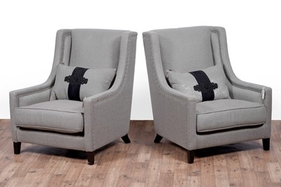 Lot 25 - Kelly Hoppen: a pair of ‘Emma’ wingback armchairs