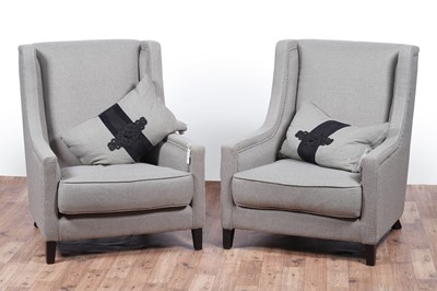 Lot 29 - Kelly Hoppen: a pair of ‘Emma’ wingback armchairs