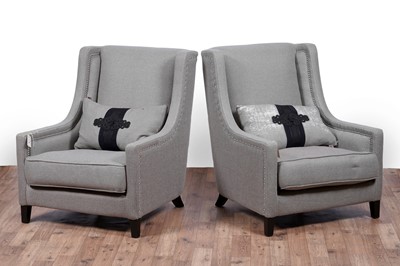 Lot 37 - Kelly Hoppen: a pair of ‘Emma’ wingback armchairs