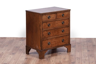 Lot 12 - A Georgian style burr walnut and walnut chest of drawers