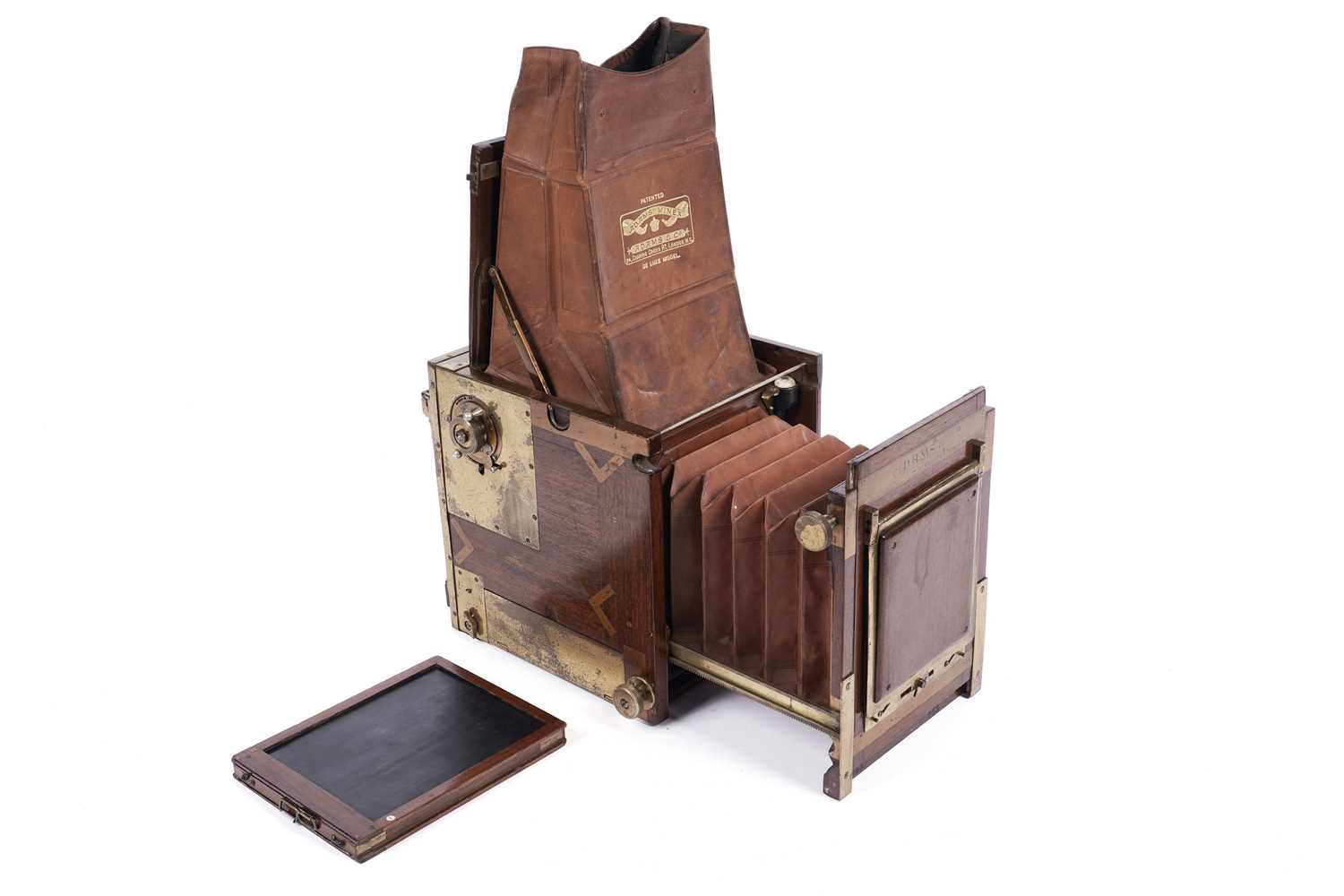 Lot 133 - An Adams Tropical Minex de Luxe half-plate reflex camera