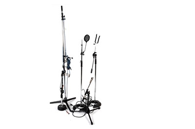 Lot 342 - Five microphone stands.