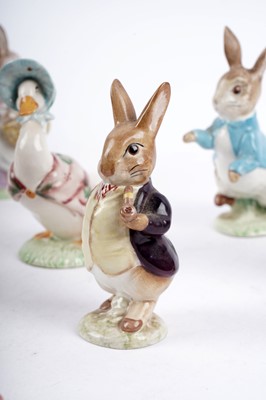 Lot 375 - A collection of Beatrix Potter figures by Beswick and Royal Albert