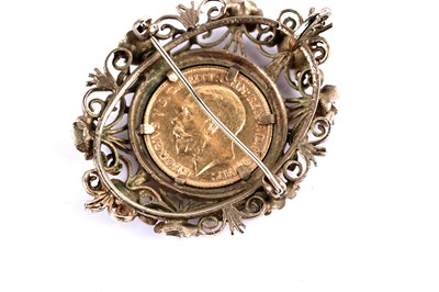 Lot 25 - A George V gold half sovereign in brooch pendant mount