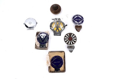 Lot 239 - A collection of vintage car badges; and a matched set of postal weights