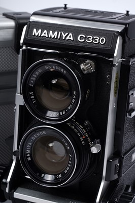 Lot 161 - A Mamiya C330 Professional f, TLR medium-format camera with extra lenses and accessories