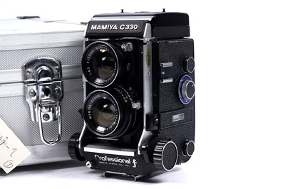 Lot 161 - A Mamiya C330 Professional f, TLR medium-format camera with extra lenses and accessories