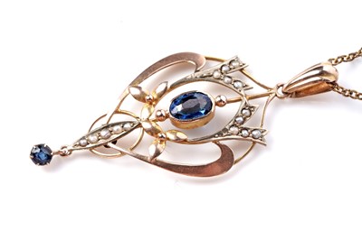 Lot 197 - An Edwardian style gold drop pendant