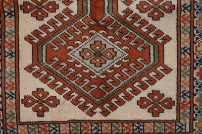 Lot 137 - A pair of Turkoman prayer rugs; and a Caucasian rug