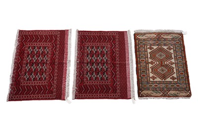 Lot 137 - A pair of Turkoman prayer rugs; and a Caucasian rug