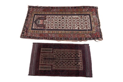 Lot 131 - An Afghan Baluch prayer rug; and a Caucasian prayer rug