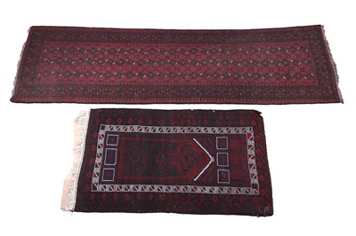 Lot 129 - An Afghan runner; and a Caucasian prayer mat