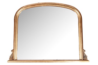 Lot 153 - A Victorian style gold painted arched over mantle mirror