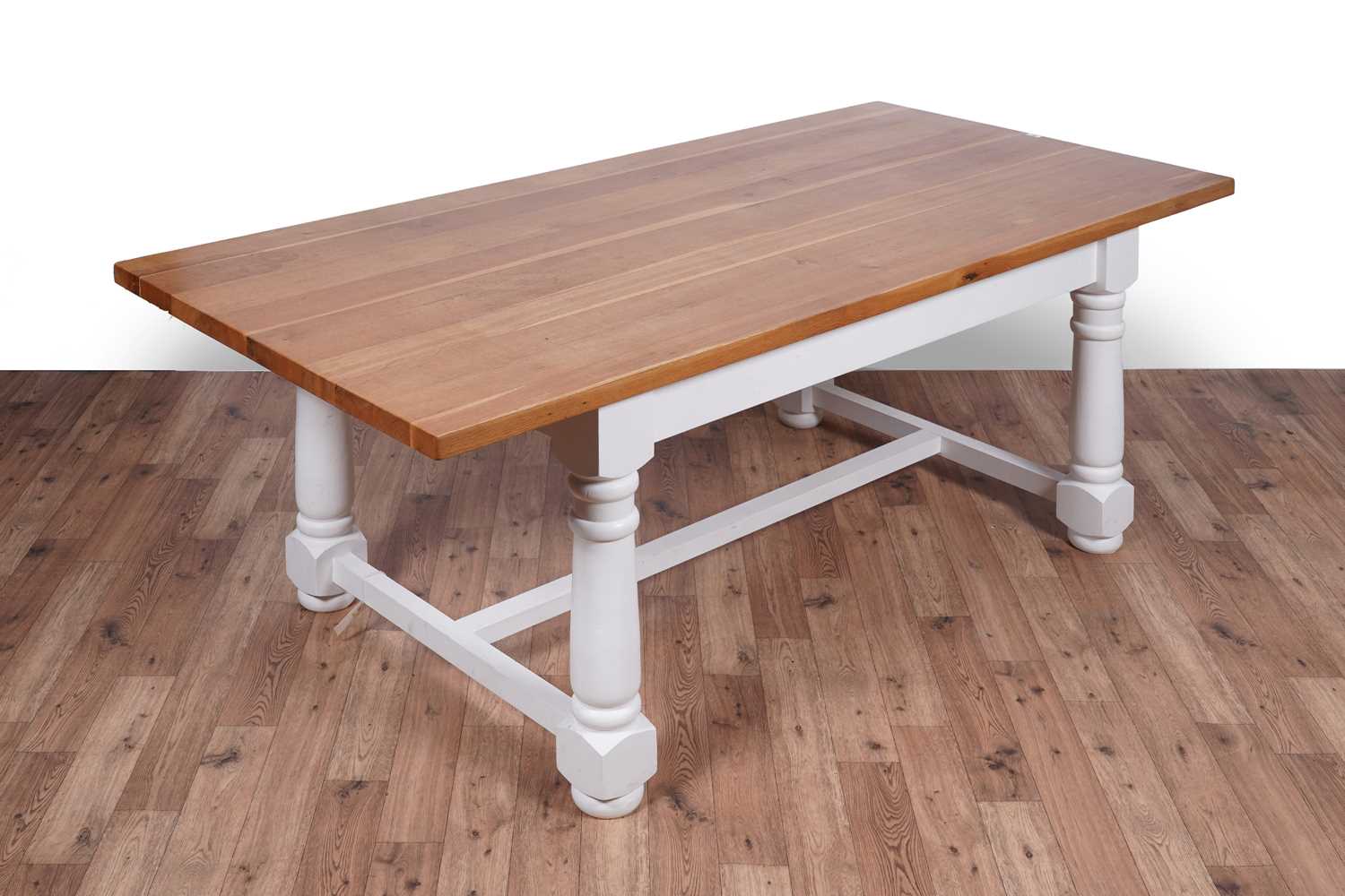 Lot 95 - A substantial oak farmhouse dining table