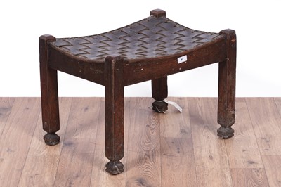 Lot 97 - In the style of Arthur W Simpson: an Arts and Crafts footstool