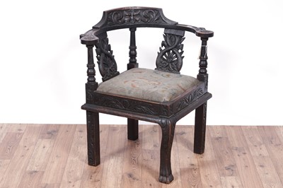 Lot 98 - Laidler Robsons & Co, Sunderland: a Victorian carved oak corner chair