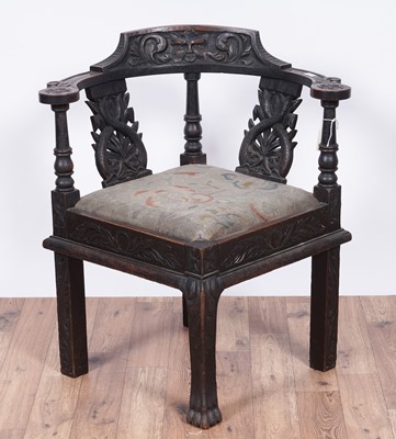 Lot 98 - Laidler Robsons & Co, Sunderland: a Victorian carved oak corner chair