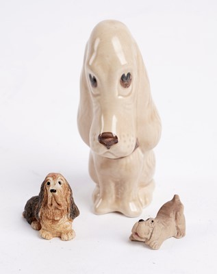 Lot 349 - ﻿A collection of decorative ceramic and other figures of basset hounds
