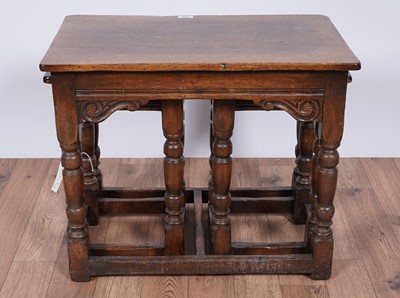 Lot 117 - Titchmarsh and Goodwin: a Georgian style oak nest of three tables