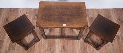 Lot 117 - Titchmarsh and Goodwin: a Georgian style oak nest of three tables