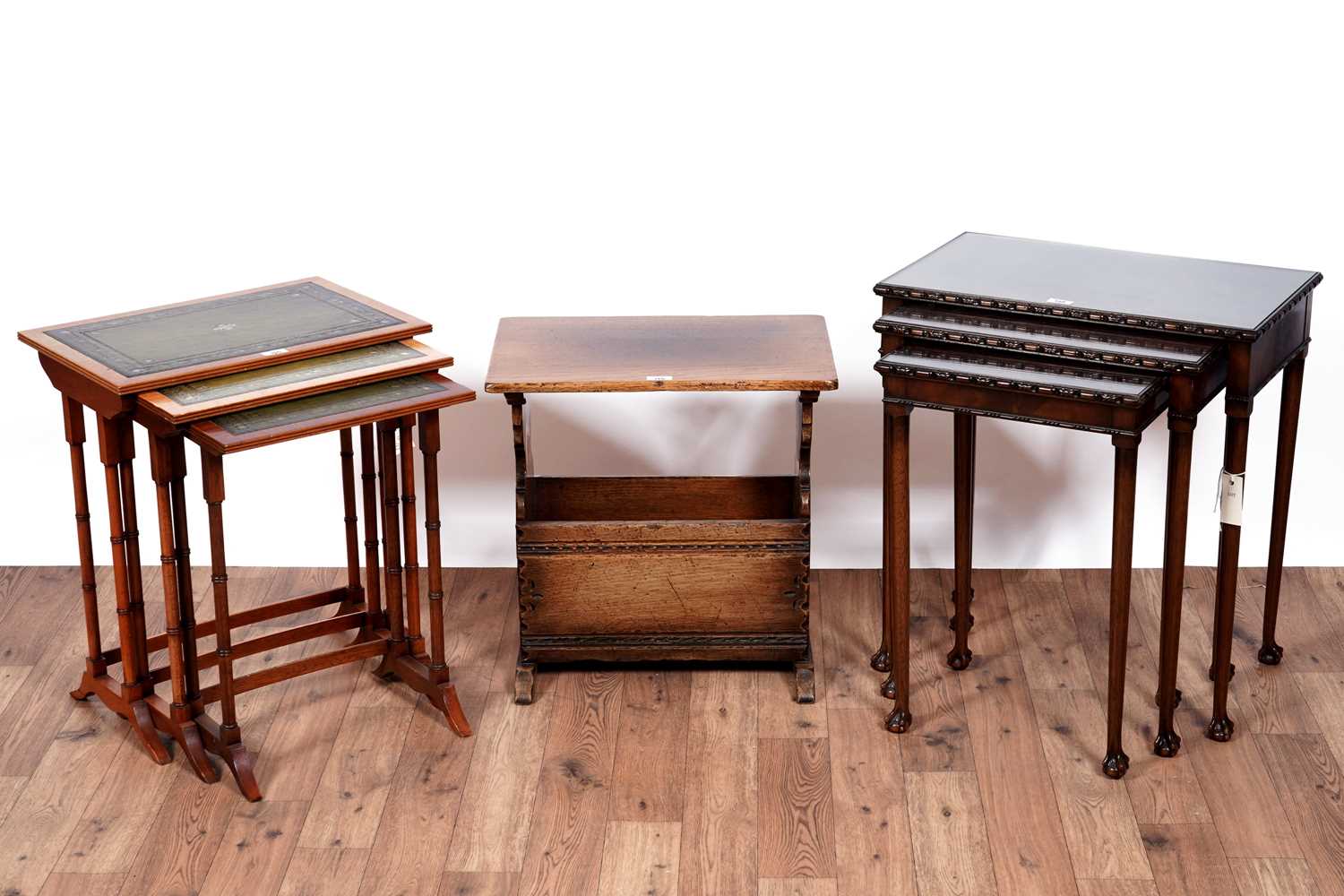 Lot 125 - Two nests of tables; and a Titchmarsh and Goodwin magazine rack